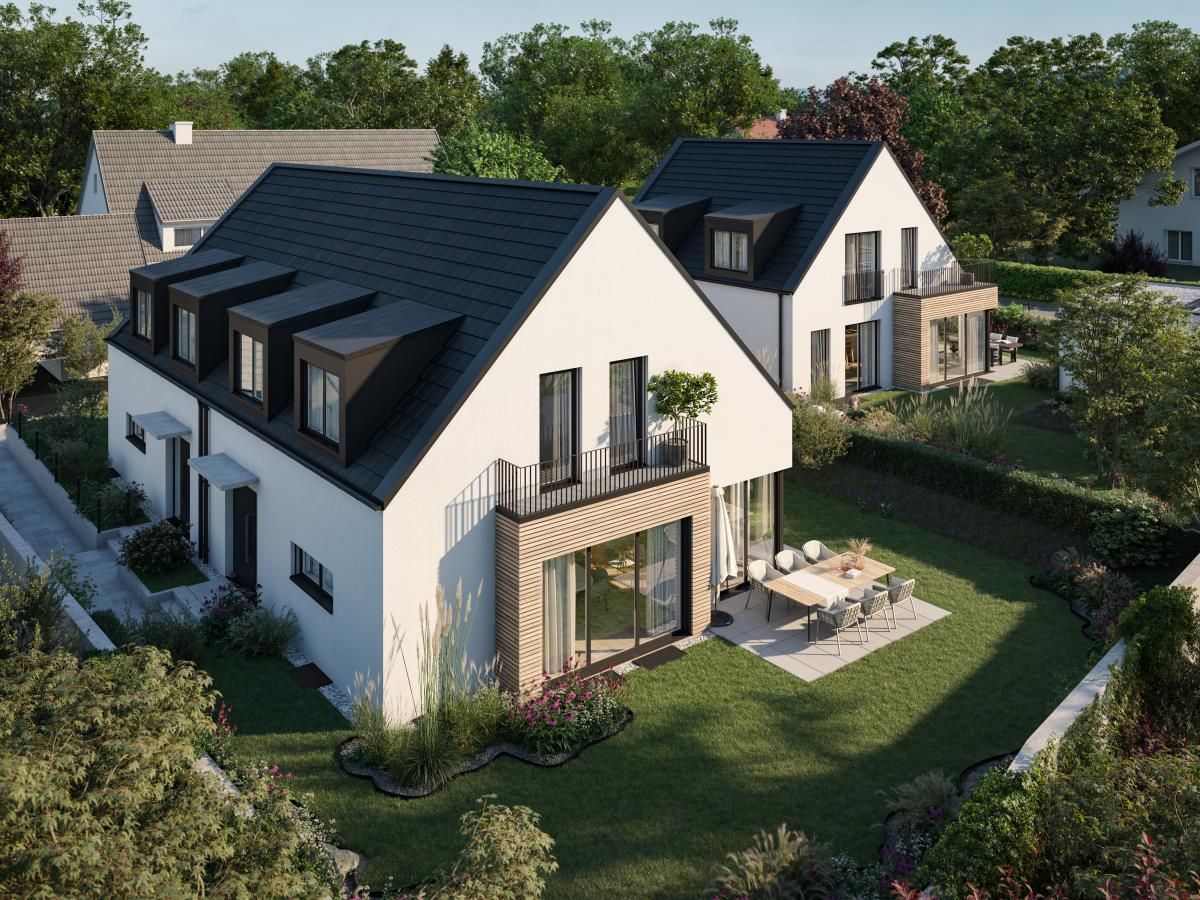 Das neue Wohngefühl. Ein modernes Doppelhaus und ein Einfamilienhaus.